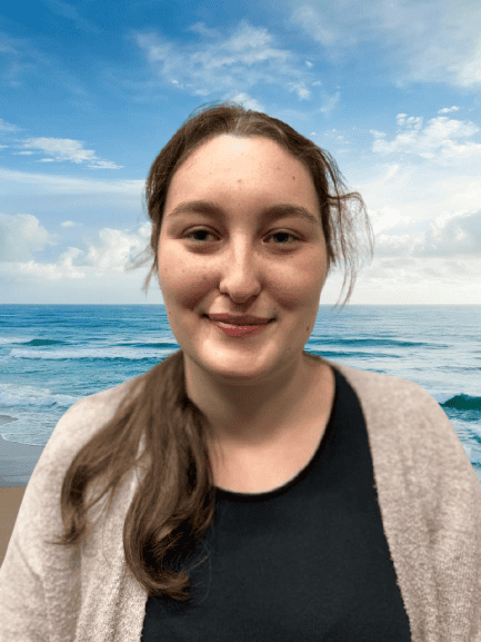 Young woman with a beach background